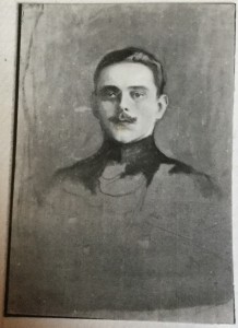 Unidentified: A Man with Dark Hair and Moustache wearing A Black Tunic Collar 112402